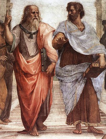 Plato gestures to the heavens and Aristotle gestures to the Earth.