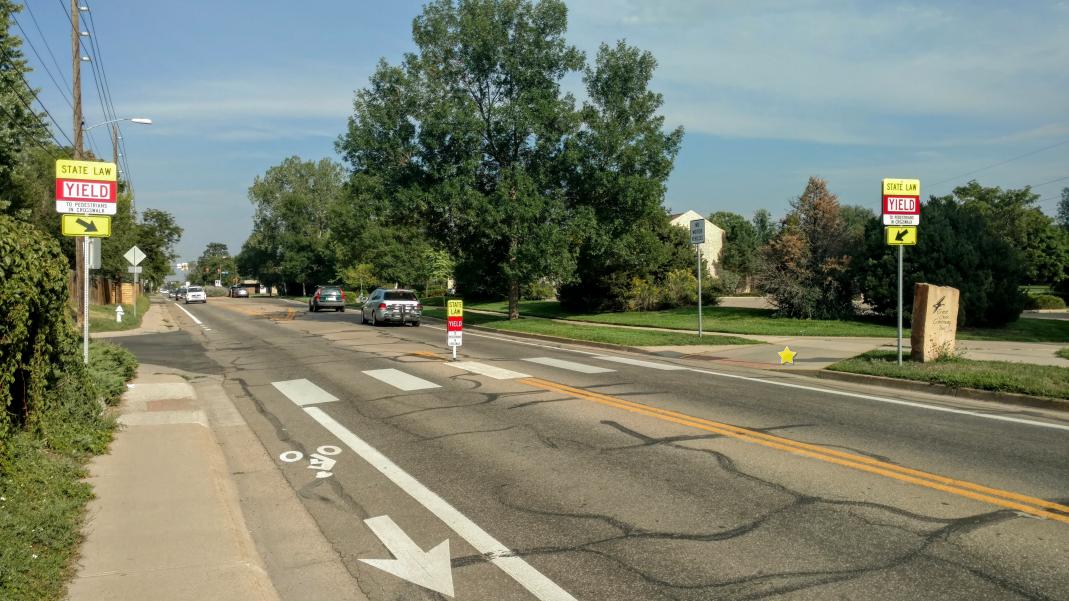 confusing intersection where right of way is clearly given to pedestrians, but bikes are not included