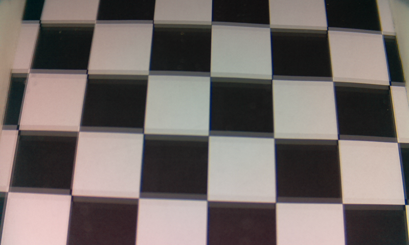 Here is an image of a grid pattern with the ghosting effect