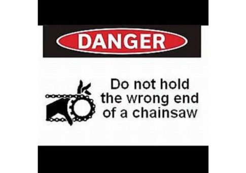 DANGER: Do not hold the wrong end of a chainsaw