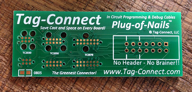 Tag Connect. Use the lower-most footprint at the left. No, not the 0805.