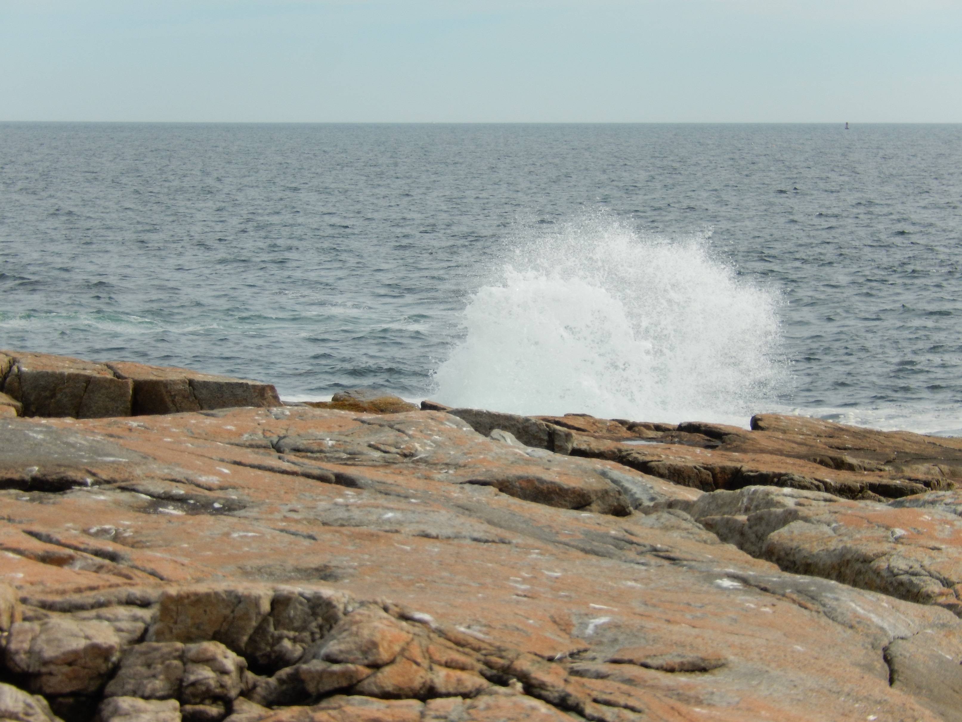 Shore with big water spray