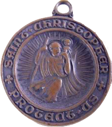 bronze St. Christopher medallion with the name "Saint Christophe" inscribed on the edge