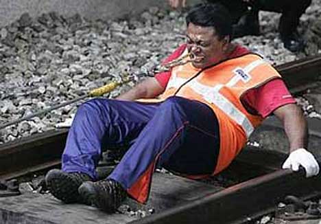 Man Pulling Train