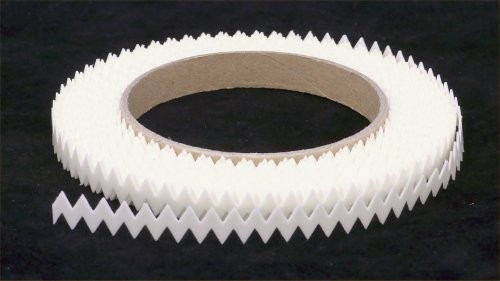 Spool of zig-zag tape