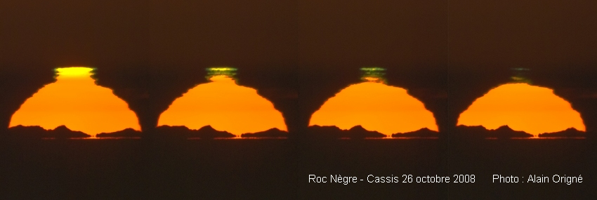 sunset showing green flash and distant mountains