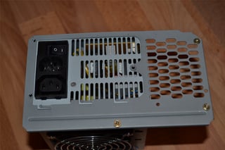 Image of the back side of Astec AA21720, the old PSU