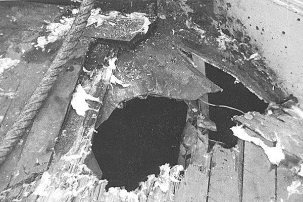 Shell damage to deck of USS Wisconsin