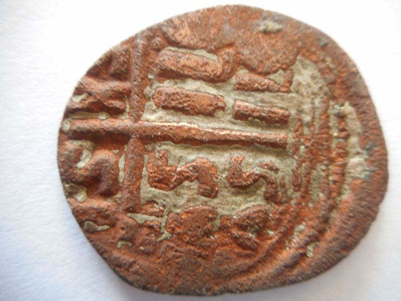 Image of old, worn copper coin