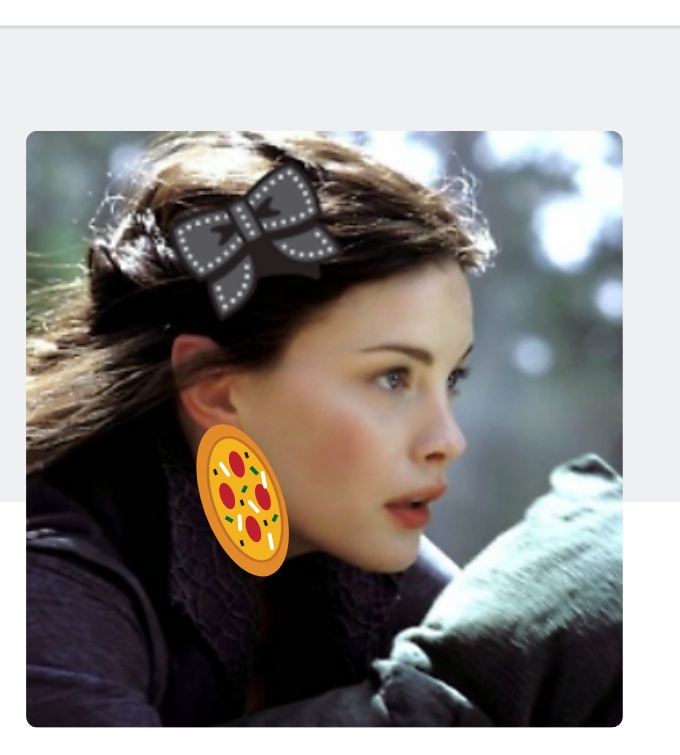 IPS me wearing pizza hat as an earring