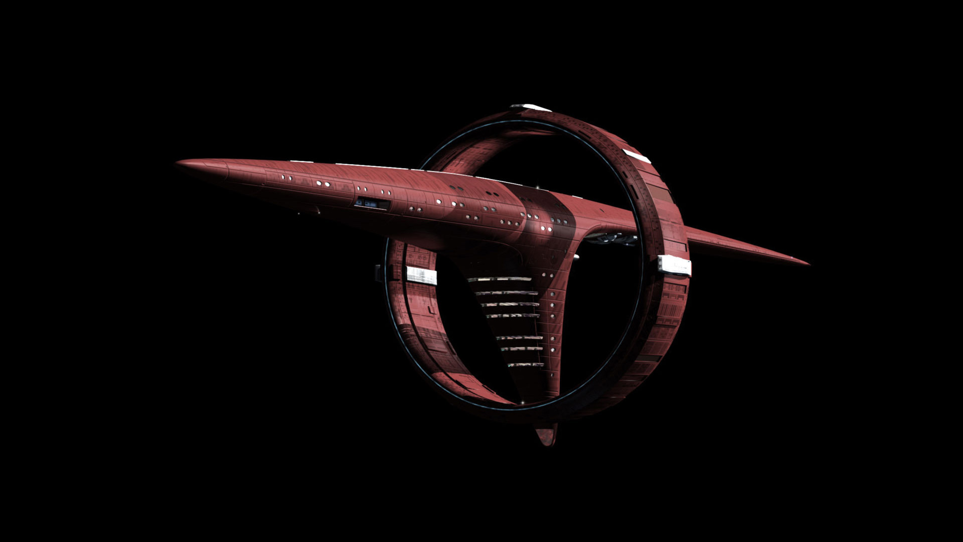 The Vulcan ship appears as a red ring attached to the middle of a long narrow double-pointed hull with a single fat branch from the main hull to the nadir of the ring.