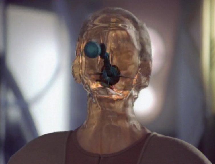 Screenshot of Odo with a weapon passing through his head