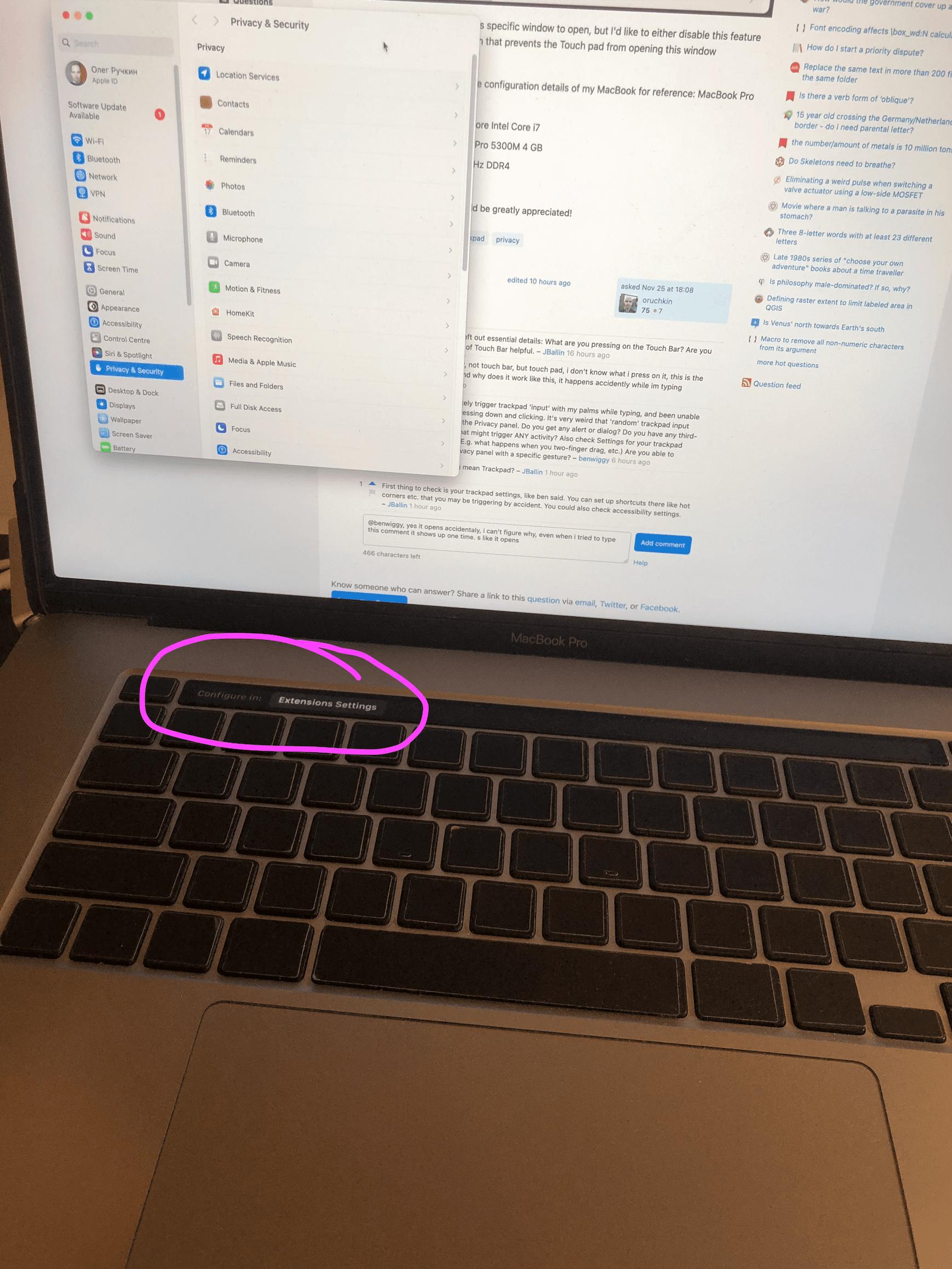 Photo of the Touch Bar on a Mac laptop with the button 'Extensions Settings' on the left side