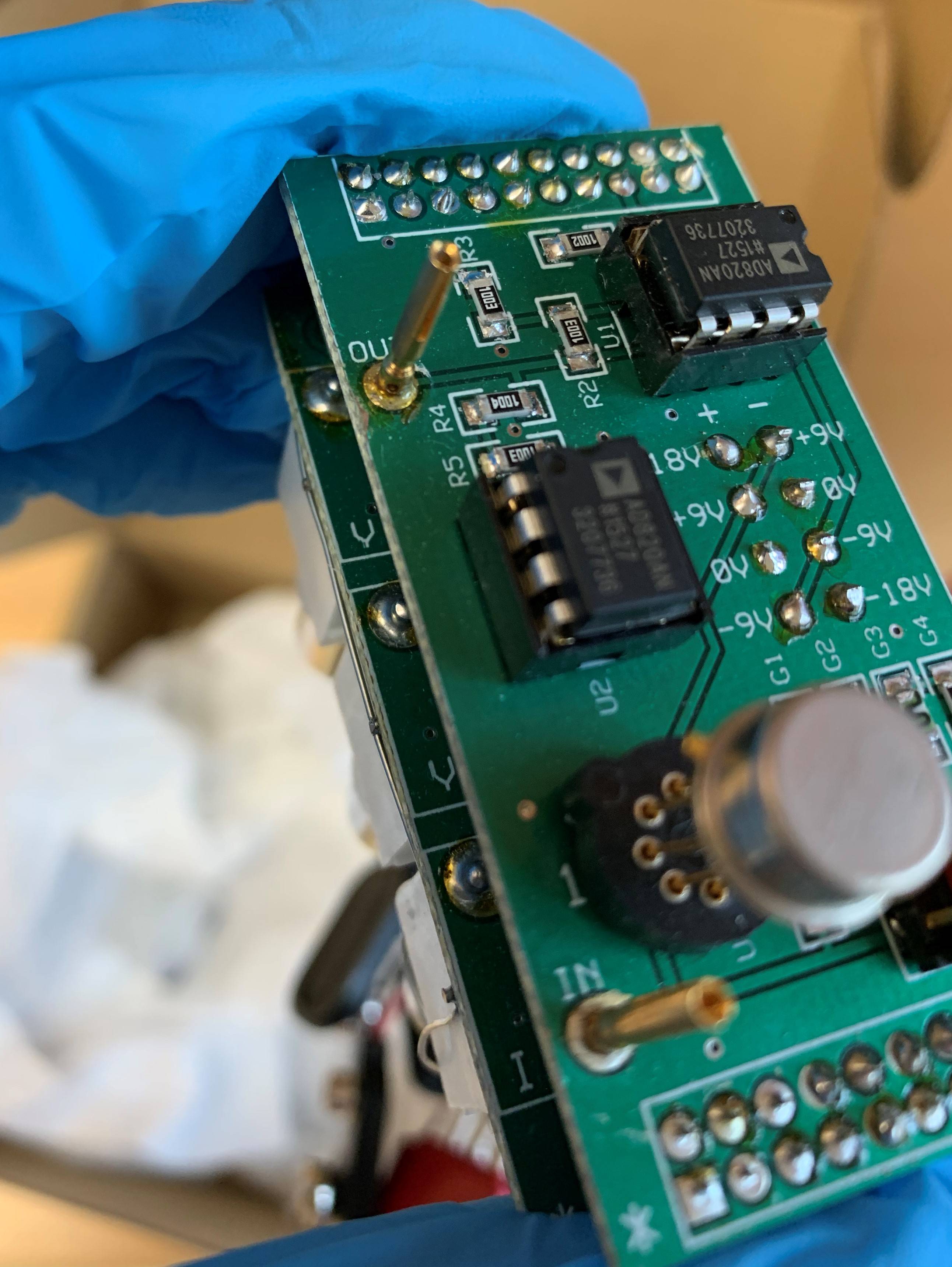 Gold connectors on transimpedance amplifier for current from electrodes