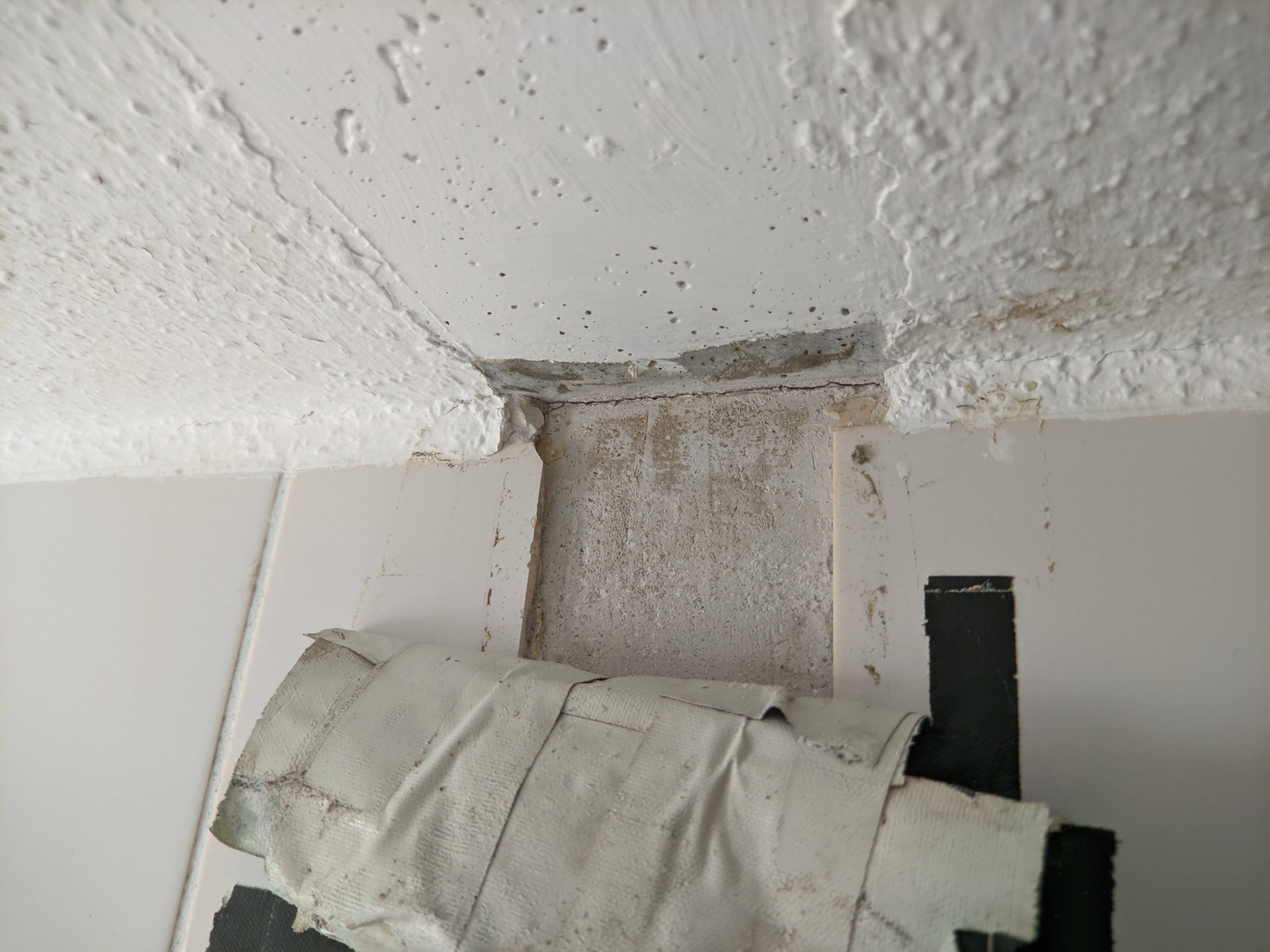 wall underneath duct tape