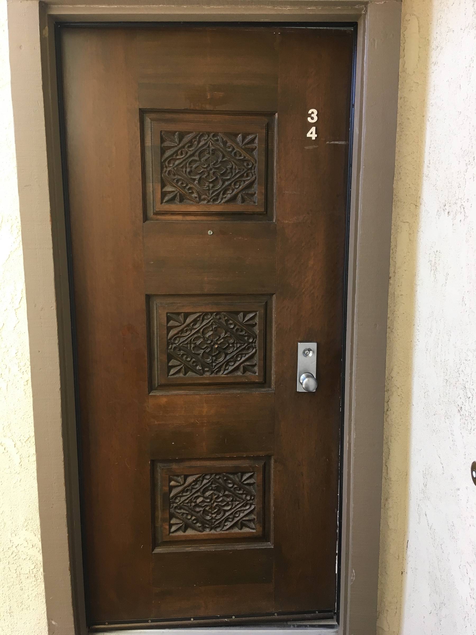 front door with carved panels