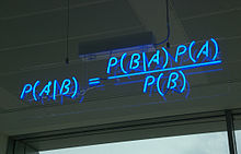 Bayes' theorem spelt out in blue neon at the offices of Autonomy in Cambridge. (c) mattbuck used under the Creative Commons Attribution-Share Alike 3.0 Unported license.]