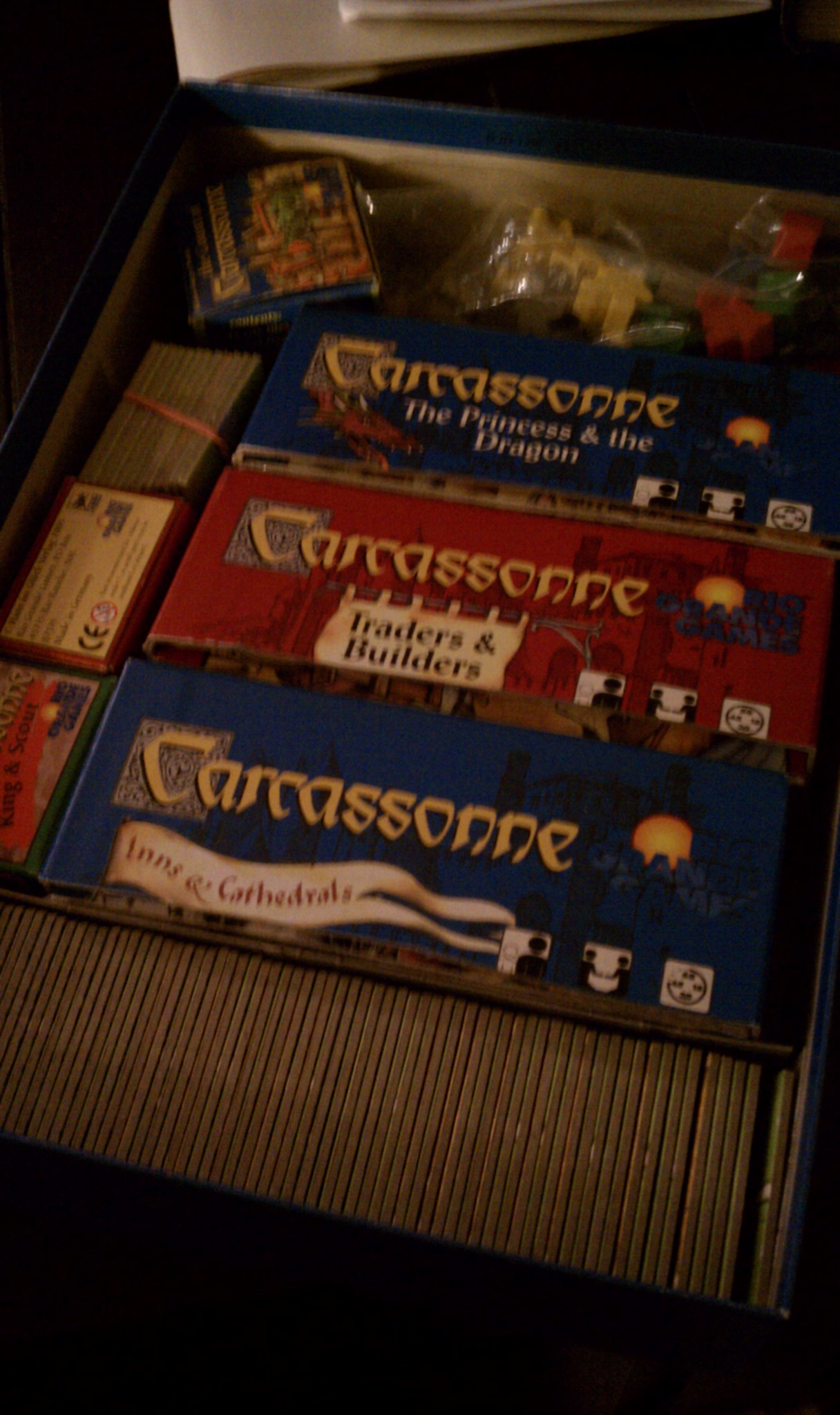 multiple expansion boxes inside main Carcassonne box