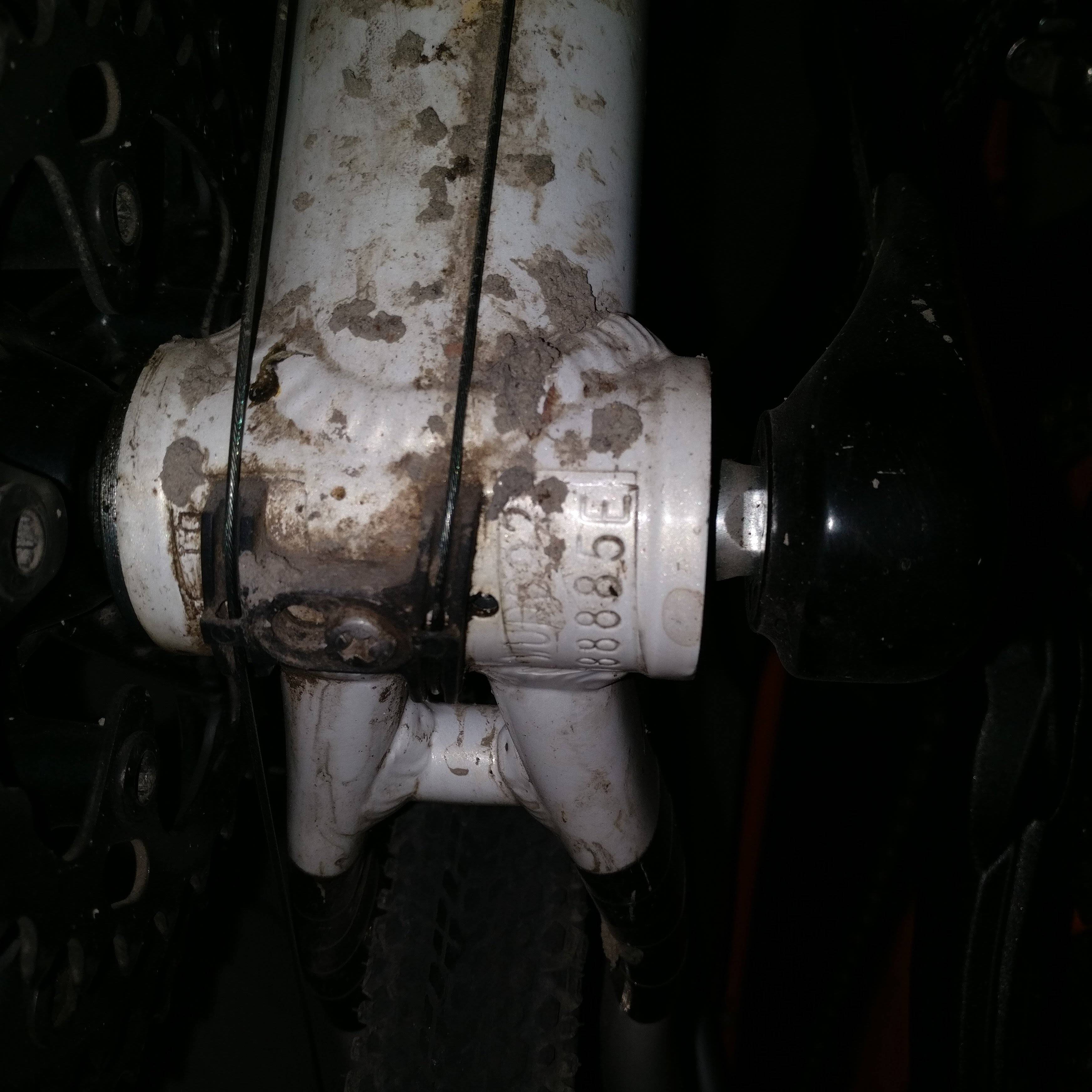 Exposed shift cables under bottom bracket