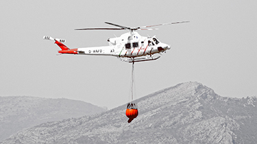 Fire fighting by heliocopter in Spain