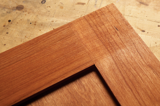 Cross-grain scratches on cabinet stile