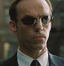 Agent Smith from the movie "The Matrix"