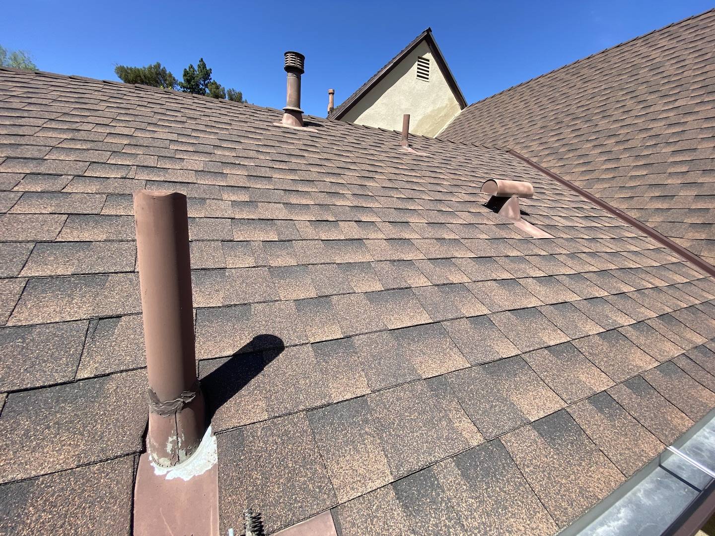 Photo of the roof above the addition, multiple vent pipes