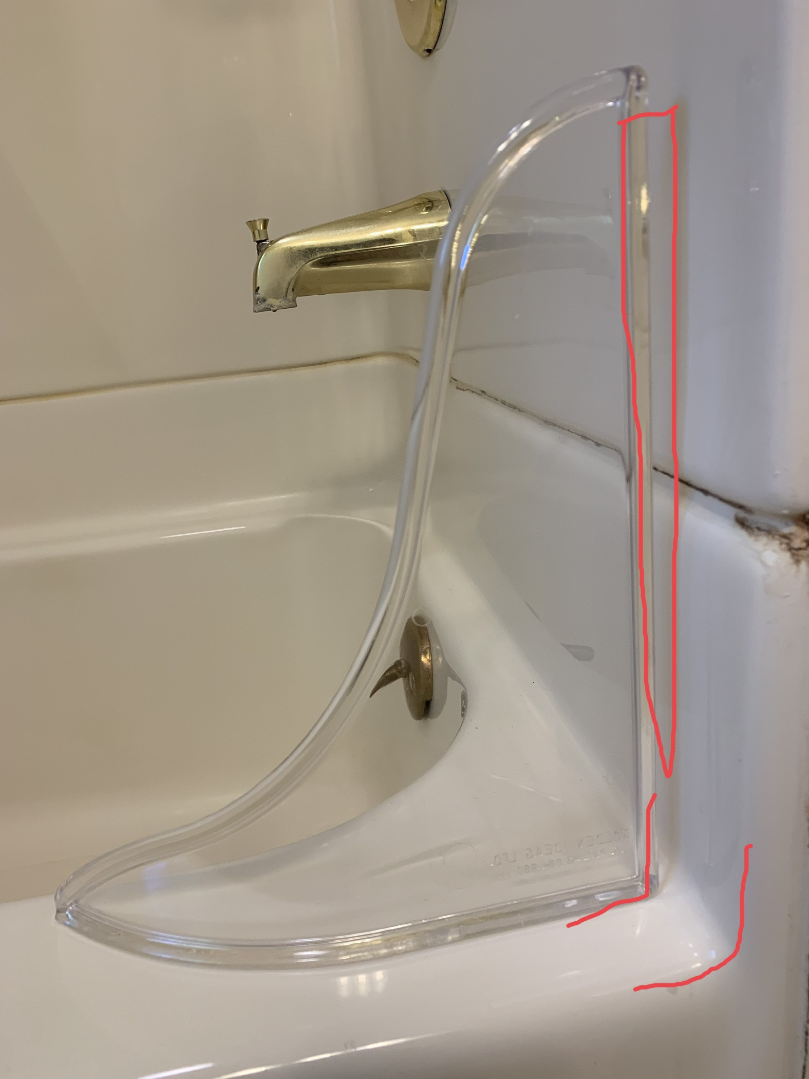 Image highlighting the gap between shower wall and splash guard