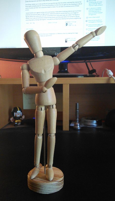 photo of my wooden art mannequin. I call him "Manny."