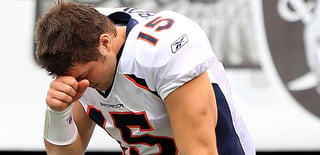 Tim Tebow in the act of Tebowing