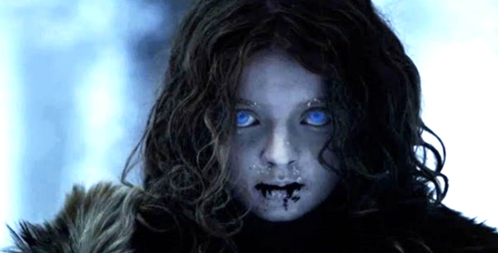 An undead little girl with glowing blue eyes and blood dripping from her mouth, as seen in S1E1 of Game of Thrones