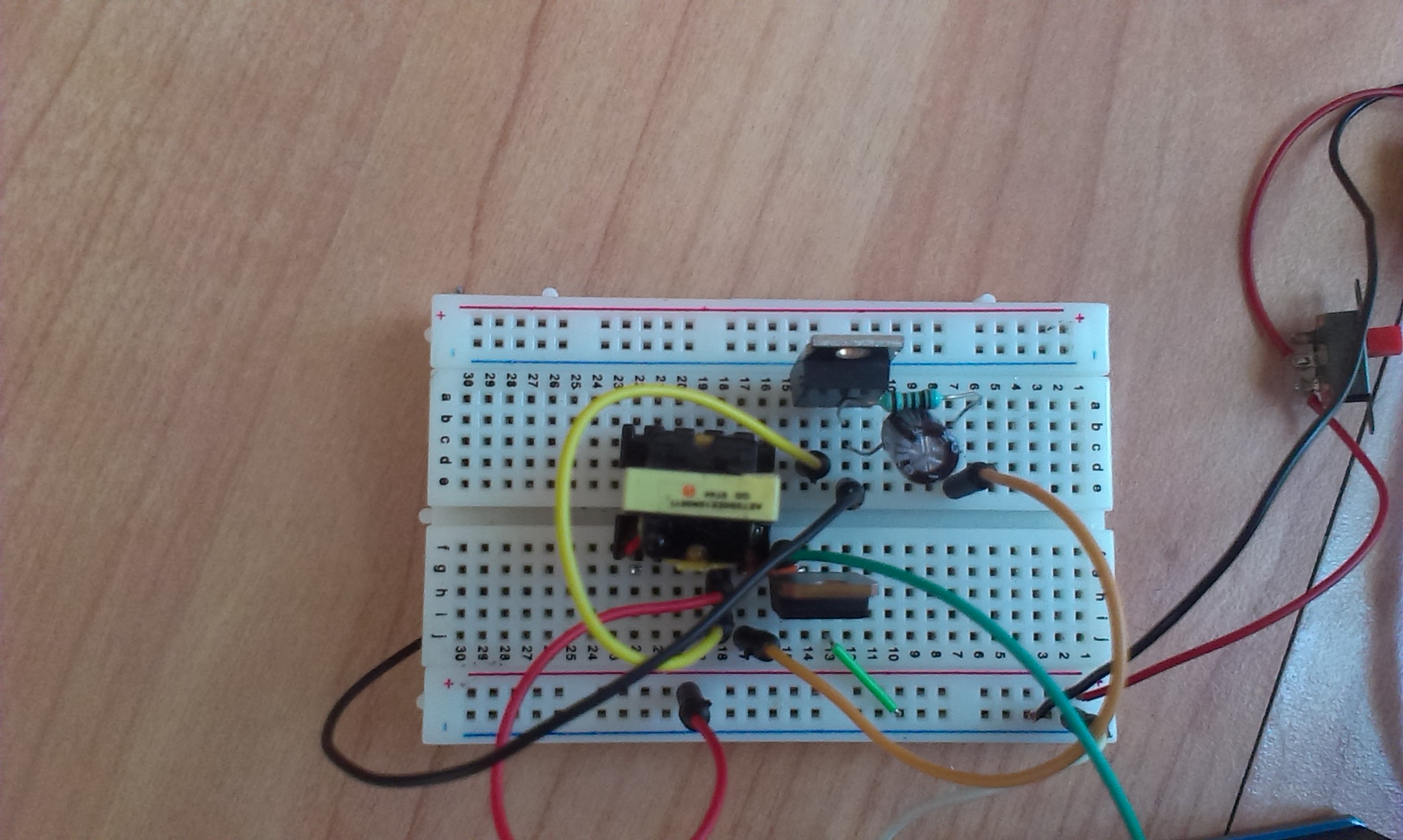 I used one coil of an old transformer as my inductor