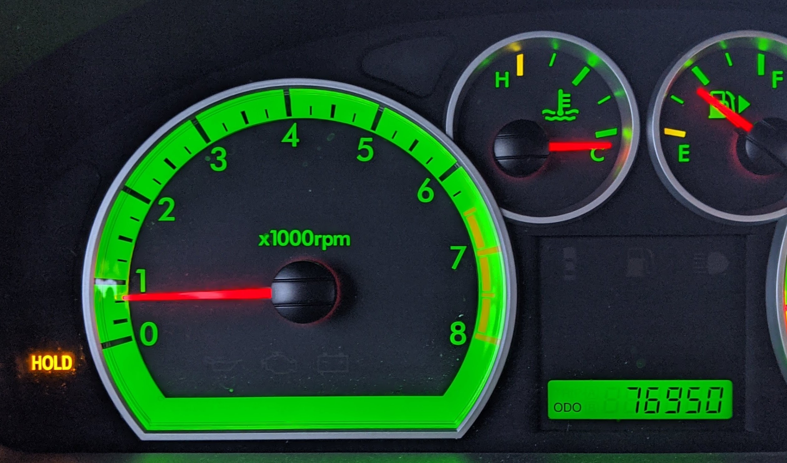 HOLD light and engine temperature gauge