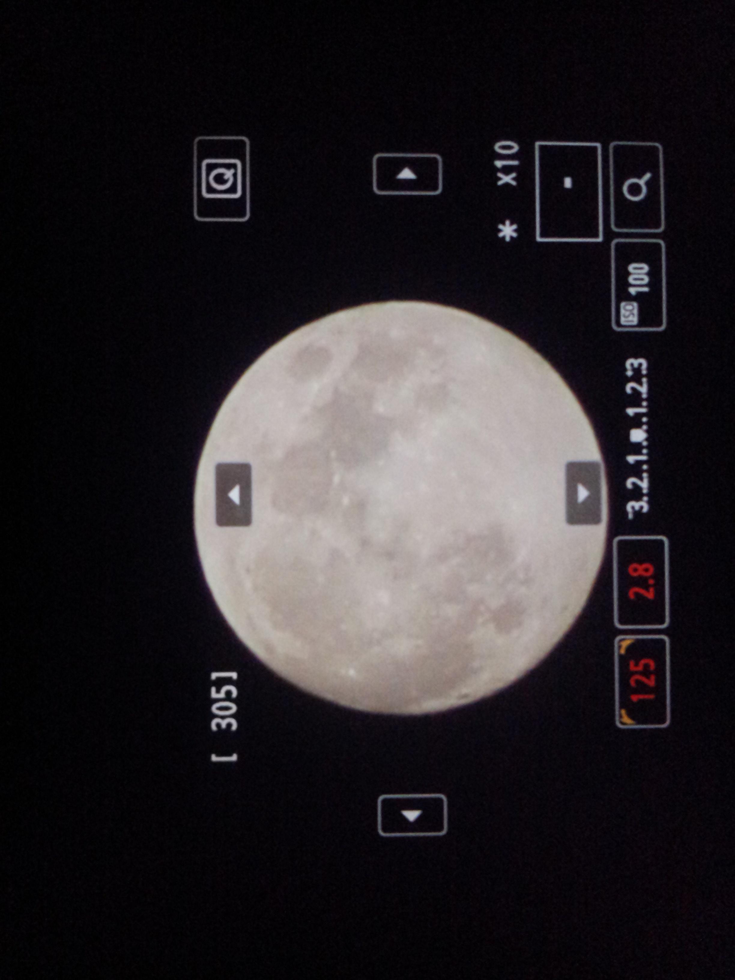 Manually focused in live view with 10x magnification - cellphone picture of camera LCD