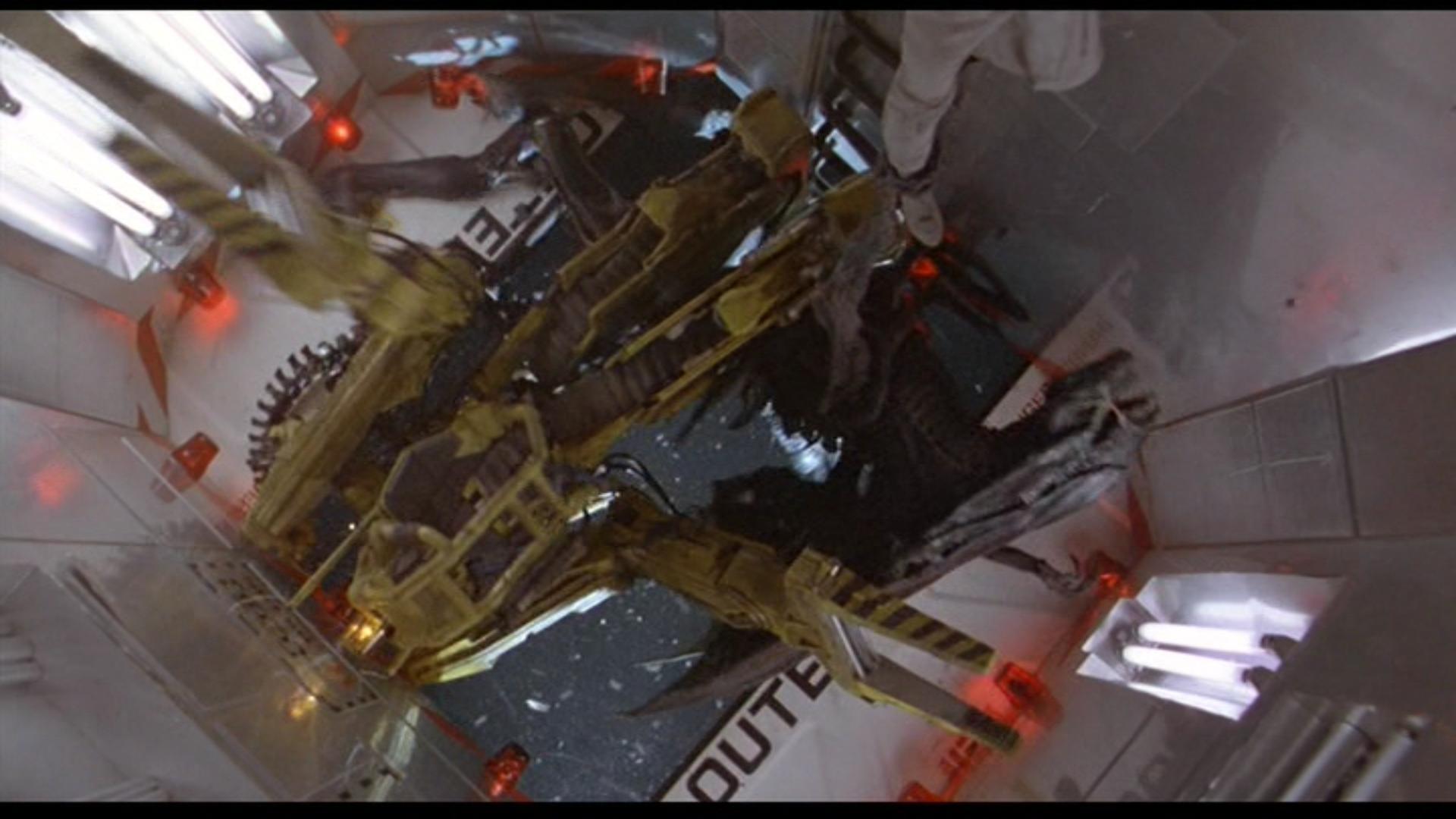 Aliens (1986) - Power Loader and Alien in Open Airlock