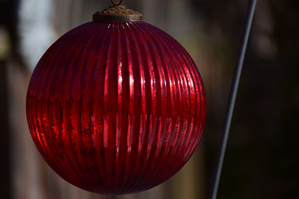 Dark but begins to show depth; doesn't capture the brilliance of the light striking the ball, though