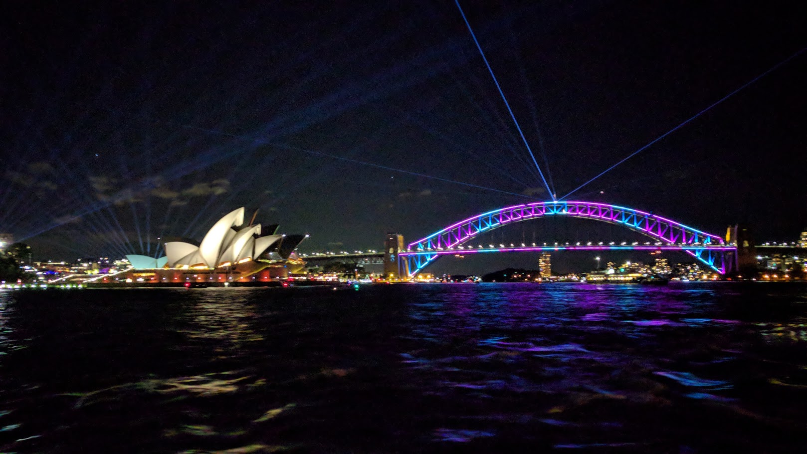 Sydney Harbour Bridge, during Vivid, taken from harbour on board a boat, May 2017