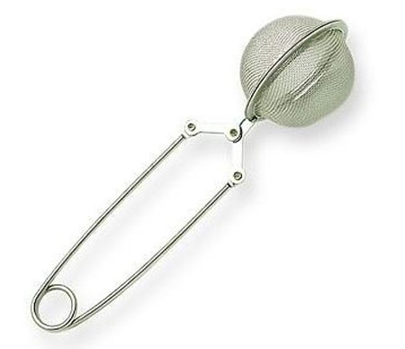 A tea infuser - two hemispheres of metal mesh that fasten together with loose tea inside