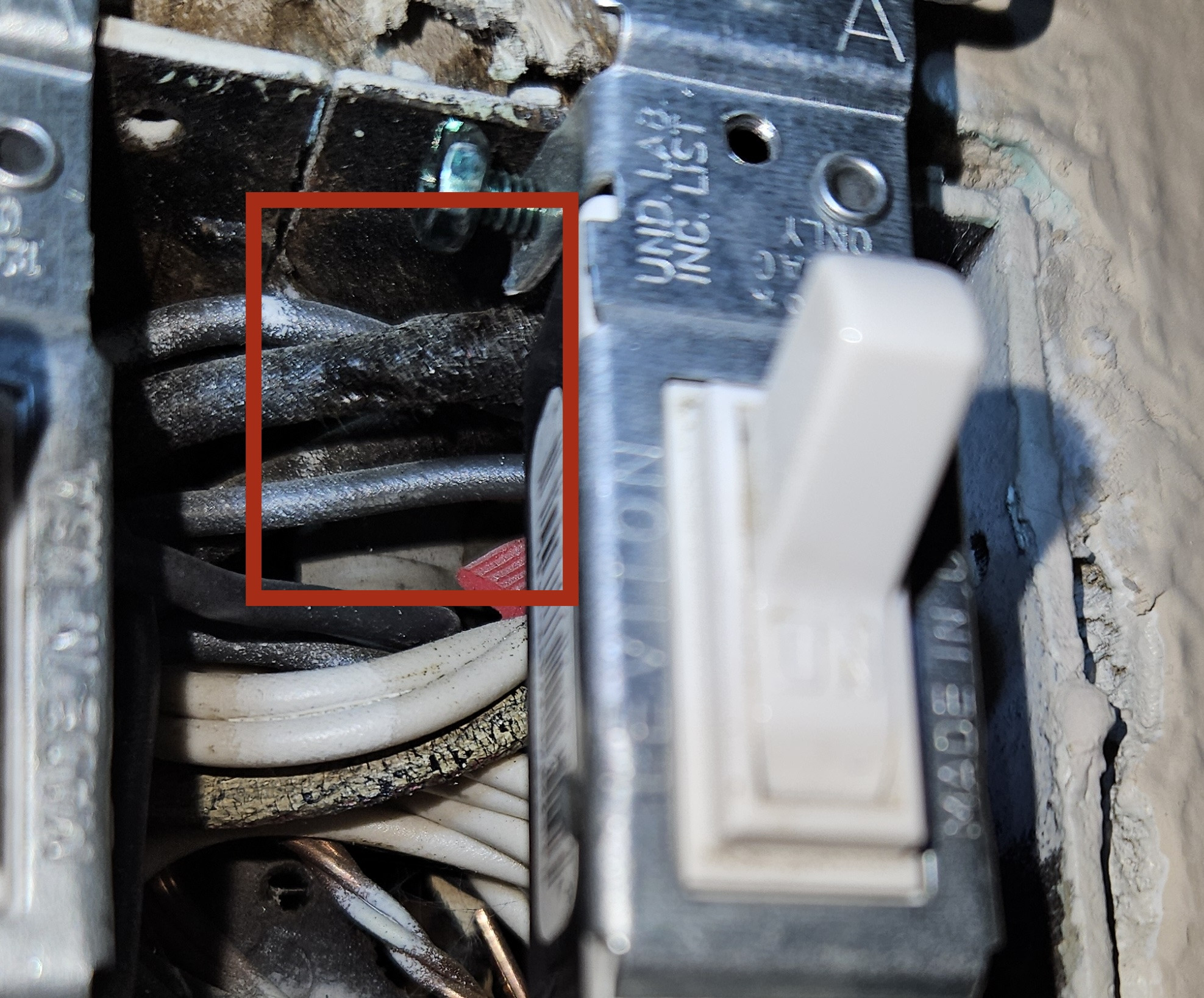 damaged insulation left-hand of switch