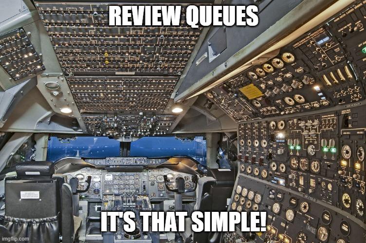 Meme image of complicated cockpit full of buttons, with text: "Review Queues - It's That Simple"