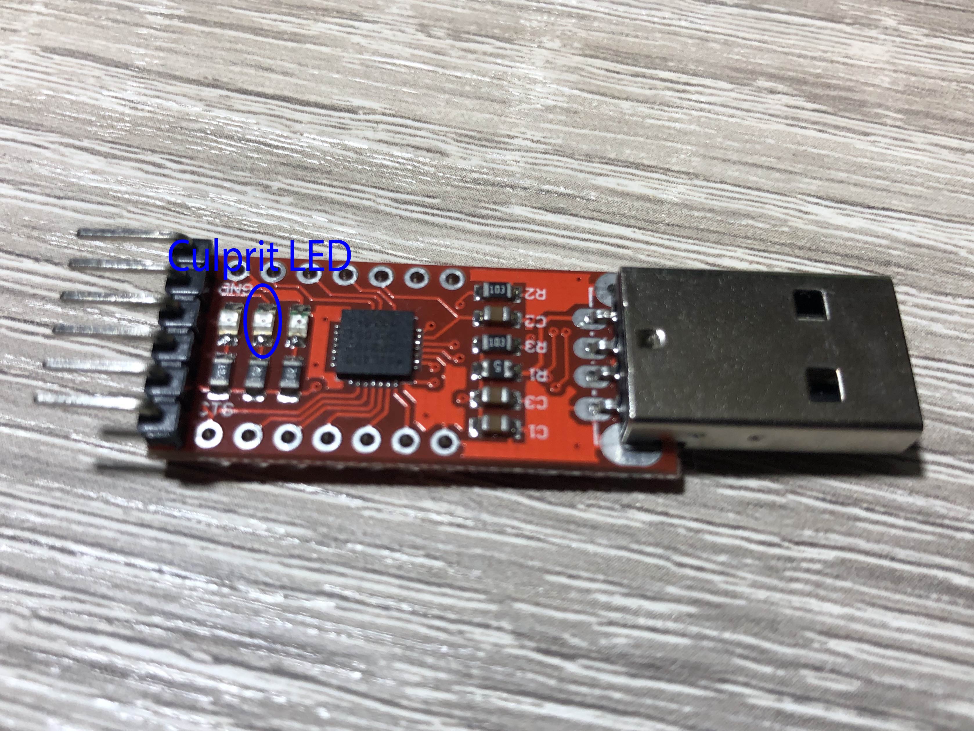 Photo of the CP2102 board with the culprit LED highlighted